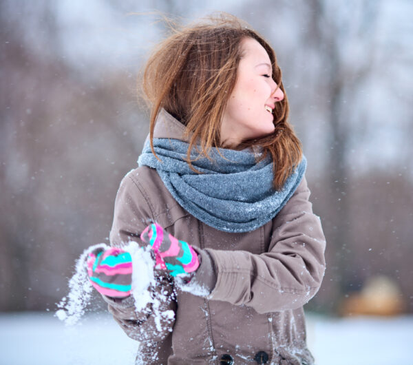 A girl making a snowball